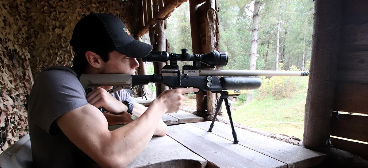 Man Aiming Air Rifle
